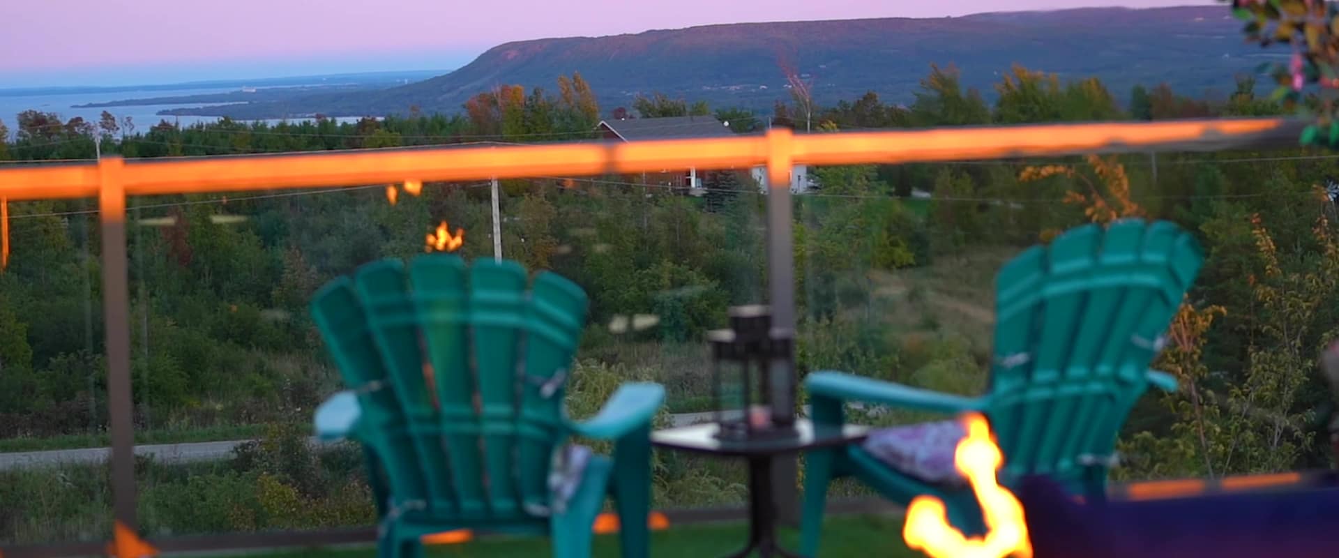 The rooftop terrace at The Collingview, looking out over the tree line to the Niagara Escarpment